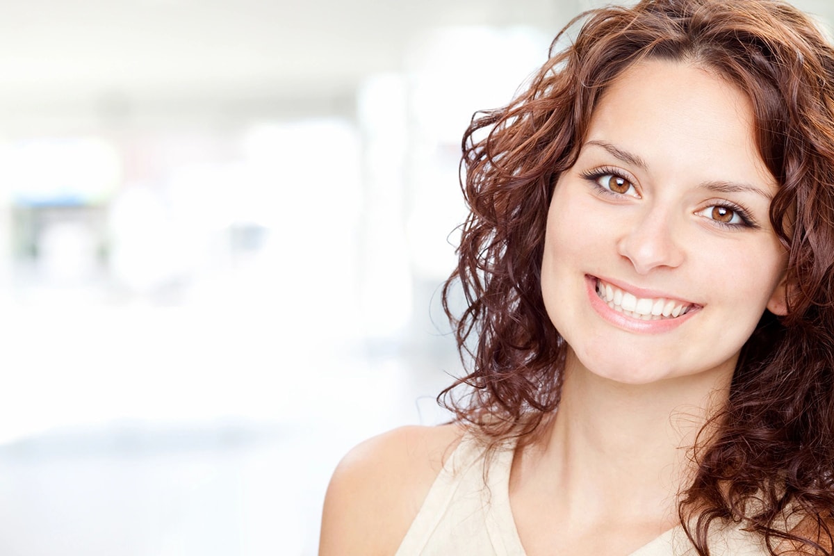 Endodoncia Mujer Sonriendo